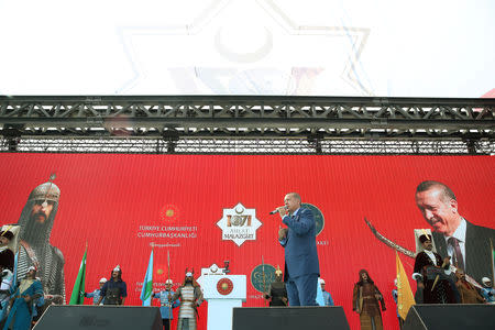 Turkish President Tayyip Erdogan makes a speech during a ceremony in the eastern city of Mus, Turkey August 26, 2018. Murat Cetinmuhurdar/Presidential Palace/Handout via REUTERS