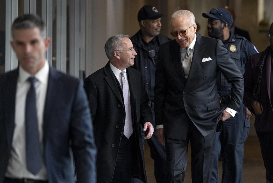 James Biden, brother of President Joe Biden, accompanied by Attorney Paul Fishman, left, arrives for a private interview with House Republicans at Thomas P. O'Neill House Office Building on Capitol Hill in Washington, Wednesday, Feb. 21, 2024. (AP Photo/Andrew Harnik)