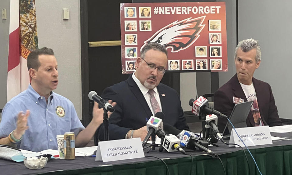 U.S. Rep. Jared Moskowitz, left, speaks at a school safety roundtable Monday, Jan. 22, at the Fort Lauderdale Marriott in Coral Springs, Florida. Also pictured are U.S. Secretary Miguel Cardona (center) and Max Schachter, whose son, Alex, was killed in the Marjory Stoneman Douglas massacre. (Scott Travis/Getty Images)