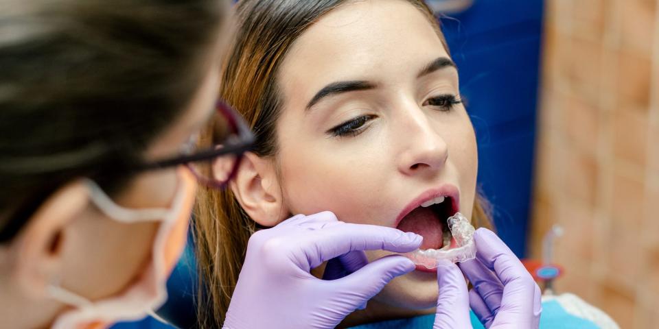 woman getting invisalign