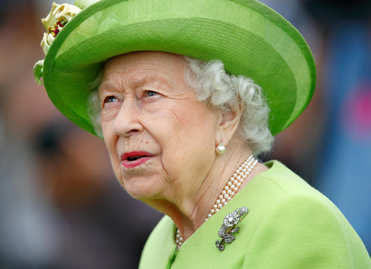 EGHAM, UNITED KINGDOM - JULY 11: (EMBARGOED FOR PUBLICATION IN UK NEWSPAPERS UNTIL 24 HOURS AFTER CREATE DATE AND TIME) Queen Elizabeth II (wearing her Vanguard Rose Brooch which she received in 1944 from Messrs John Brown and Co. when she launched HMS Vanguard) attends the Out-Sourcing Inc. Royal Windsor Cup polo match and a carriage driving display by the British Driving Society at Guards Polo Club, Smith's Lawn on July 11, 2021 in Egham, England. (Photo by Max Mumby/Indigo/Getty Images)