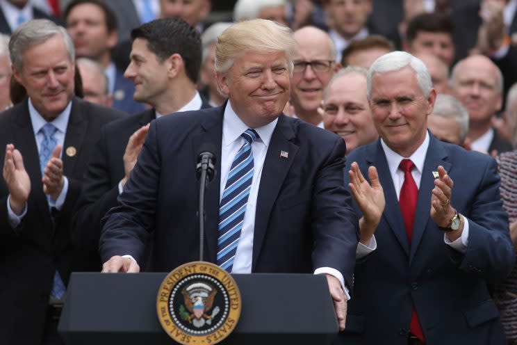 U.S. President Donald Trump (C) gathers with Vice President Mike Pence (R) and Congressional Republicans in the Rose Garden of the White House after the House of Representatives approved the American Healthcare Act, to repeal major parts of Obamacare and replace it with the Republican healthcare plan, in Washington, May 4, 2017. (Photo: Carlos Barria/Reuters)