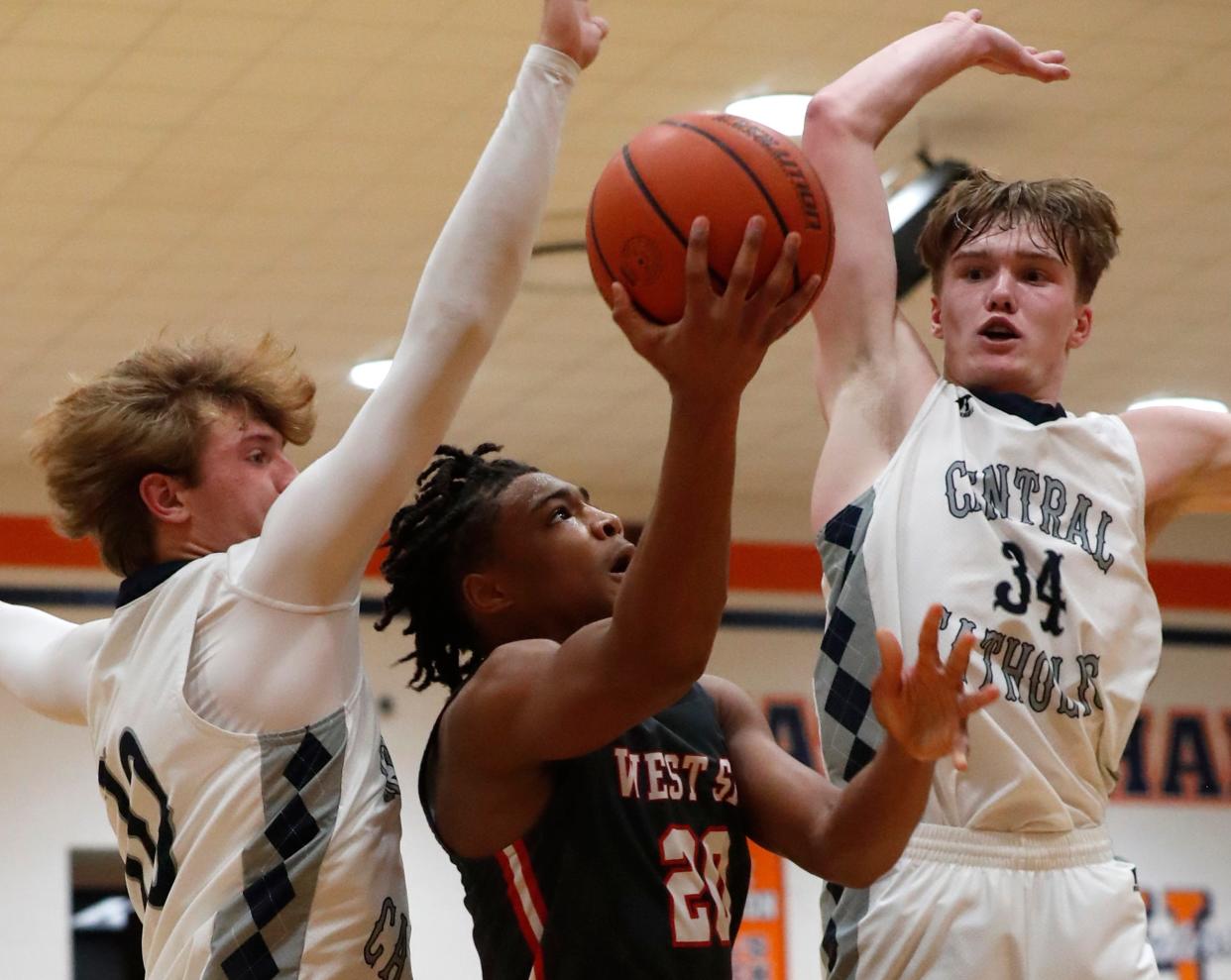 West Lafayette Red Devils Donovan Loudermill (20) goes up for a shot during the IU Health Hoops Classic boys basketball tournament against the Central Catholic Knight, Tuesday, Nov. 29, 2022, at May Gymnasium in West Lafayette, Ind. West Lafayette won 59-52.