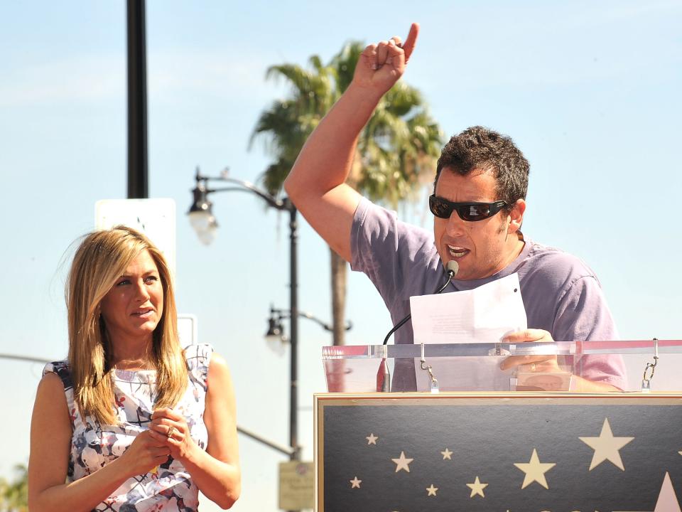 Jennifer Aniston and Adam Sandler attends the Jennifer Aniston Hollywood Walk Of Fame Induction Ceremony