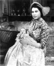 <p>Queen Elizabeth holds newborn Anne.</p>