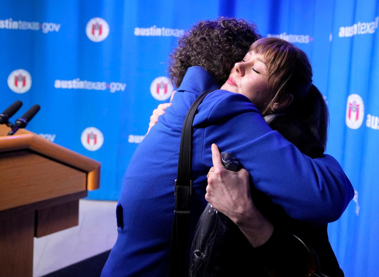 Austin City Council Member Alison Alter, left, hugs Julie Ann Nitsch after the city of Austin apologized Tuesday at City Hall to her and other plaintiffs in a suit about the mishandling of rape kits.