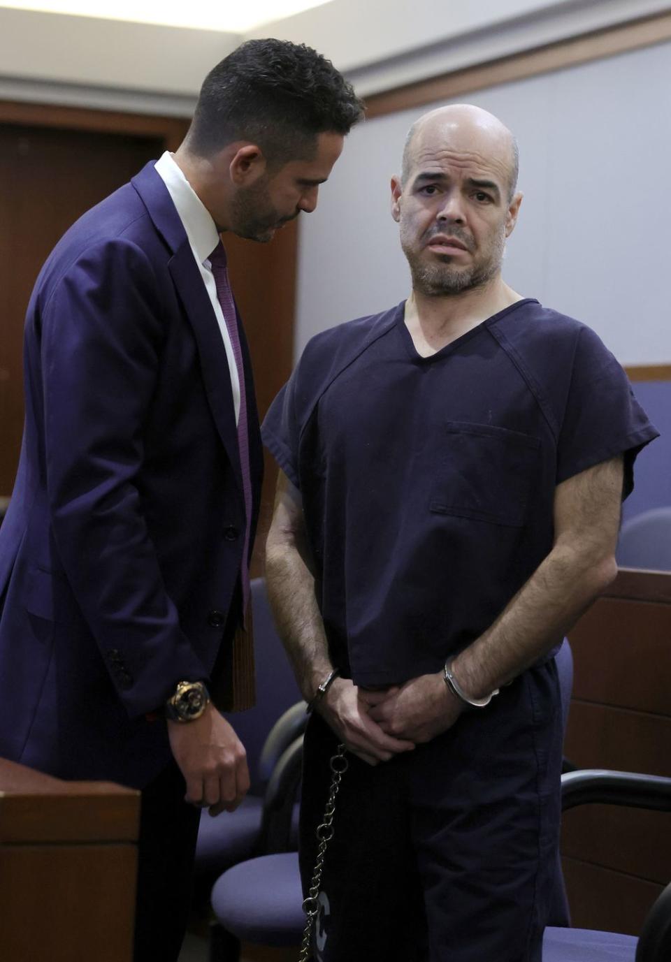 las vegas, nevada   september 20 clark county public defender david lopez negrete l talks with clark county public administrator robert telles as he appears in court for an arraignment on an open murder charge in las vegas justice court at the regional justice center on september 20, 2022 in las vegas, nevada telles has been charged in the murder of las vegas review journal investigative reporter jeff german german had recently reported for months on the turmoil surrounding telles oversight of the office, and the administrator subsequently lost his re election bid in junes primary election photo by ethan millergetty images