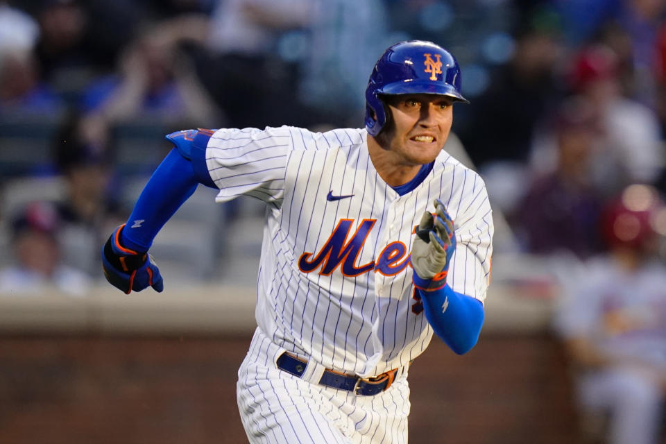 New York Mets' Brandon Nimmo runs up the first base line on his way to a double during the third inning in the second baseball game of a doubleheader against the St. Louis Cardinals Tuesday, May 17, 2022, in New York. (AP Photo/Frank Franklin II)