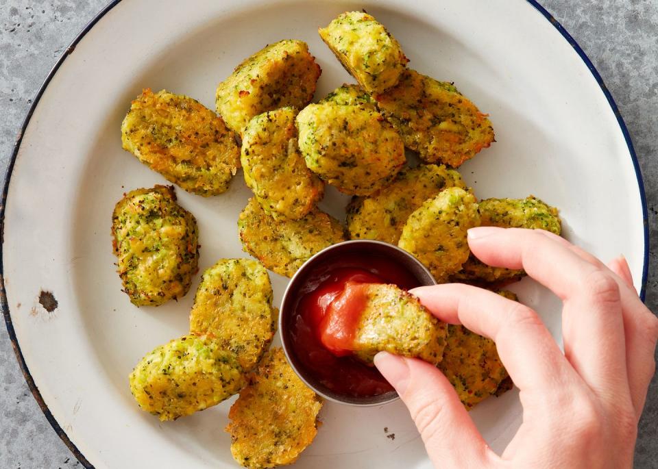 <p>In this dish, simple ingredients come together for an irresistible healthy snack you're sure to be making on repeat. Play around with different cheeses: We use cheddar here, but Monterey Jack would be super melty and amazing, too.</p><p>Get the <strong><a href="https://www.delish.com/cooking/recipe-ideas/a39721383/air-fryer-broccoli-ranch-tots-recipe/" rel="nofollow noopener" target="_blank" data-ylk="slk:Air Fryer Broccoli Ranch Tots recipe;elm:context_link;itc:0;sec:content-canvas" class="link ">Air Fryer Broccoli Ranch Tots recipe</a></strong>.</p>