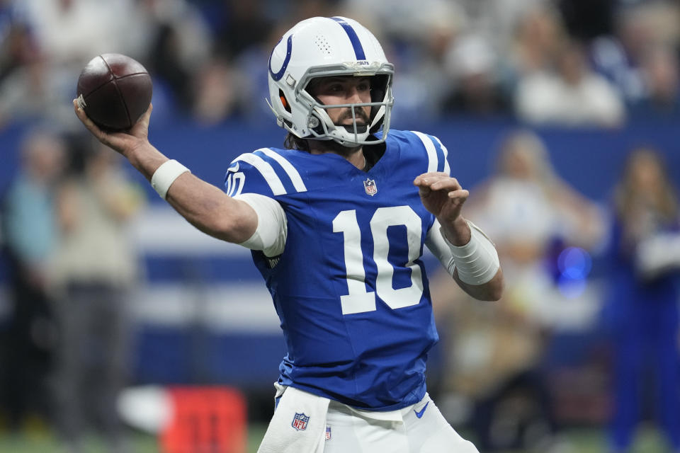 FILE - Indianapolis Colts quarterback Gardner Minshew throws a pass during the first half of an NFL football game against the Houston Texans, Jan. 6, 2024, in Indianapolis. Minshew on Monday, March 11, 2024, agreed to a two-year, $25 million contract with the Las Vegas Raiders. (AP Photo/Michael Conroy, File)