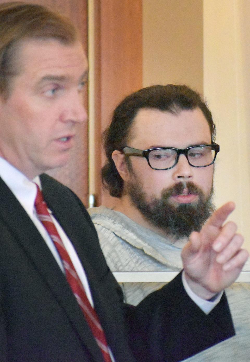 John Almond's lawyer James Hanley talks to Superior Court Judge Raffi Yessayan in Superior Court in Fall River Friday, March 10.