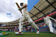 Cricket - Ashes test match - Australia v England - GABBA Ground, Brisbane, Australia, November 23, 2017. England's opening batsmen Alastair Cook and Mark Stoneman walk onto the ground for the start of the first day of the first Ashes cricket test match. REUTERS/David Gray