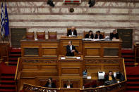 Former Greek Prime Minister Antonis Samaras addresses lawmakers during a parliamentary session before a vote on setting up a special committee which will probe the role of ten politicians in a case which involves alleged bribery by Swiss drugmaker Novartis, in Athens, Greece, February 21, 2018. REUTERS/Alkis Konstantinidis