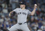 New York Yankees pitcher Carlos Rodon works against the Toronto Blue Jays during the first inning of a baseball game in Toronto on Tuesday, April 16, 2024. (Nathan Denette/The Canadian Press via AP)