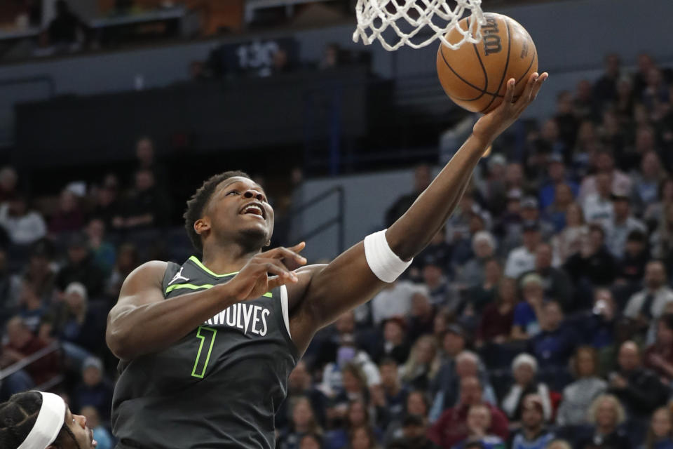 Minnesota Timberwolves forward Anthony Edwards goes to the basket against the Oklahoma City Thunder in the first quarter of an NBA basketball game Saturday, Dec. 3, 2022, in Minneapolis. (AP Photo/Bruce Kluckhohn)