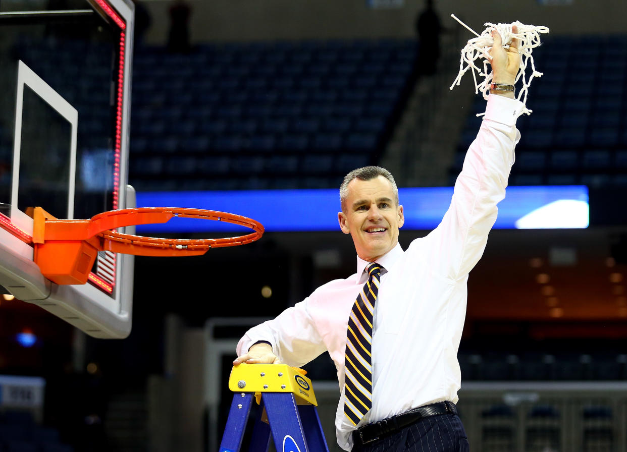 Florida will name its basketball court after longtime coach Billy Donovan, seen here cutting down the net after beating Dayton in the south regional final of the 2014 NCAA Tournament, early next year.