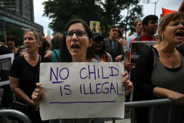 Questions raised over Trump's quick-fix end to separating migrant families as republicans struggle to pass bill