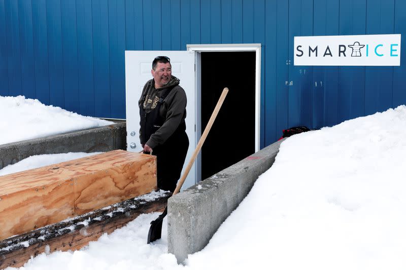 The Wider Image: Climate change means the Inuit do what they've always done: Adapt