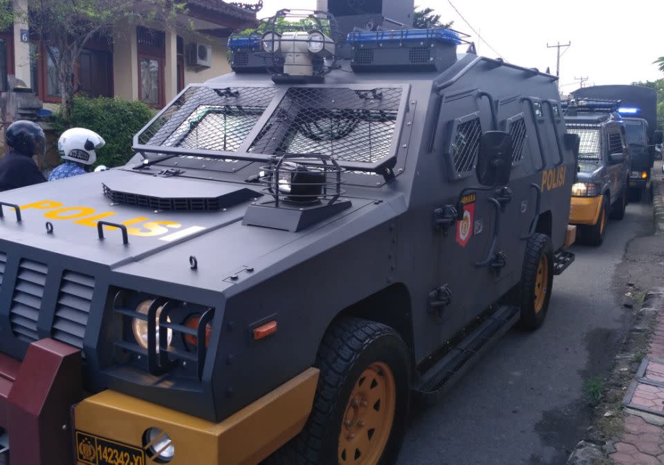 Armoured vehicles were used in the military-style operation to get Corby to the airport. Photo: EPA