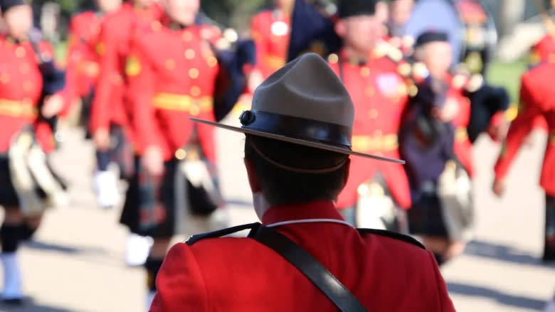 An officer takes position during the change of command ceremony on September 6, 2018 for new commissioner Brenda Lucki at the RCMP Heritage Centre in Regina. (Olivia Stefanovich/CBC)