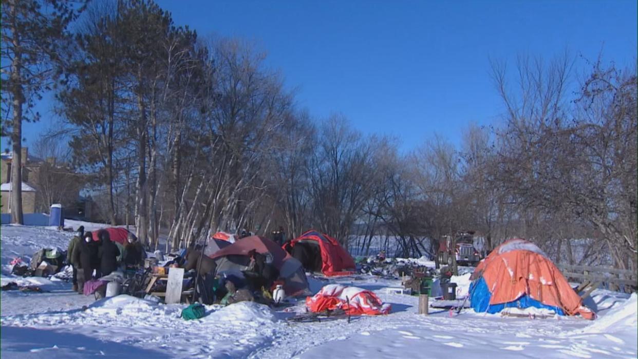 Are homeless encampments a solution to the problem? CBC News asked front-line professionals, homeless organizations, politicians, public safety experts, and researchers in New Brunswick for their opinions. (Ed Hunter/CBC - image credit)