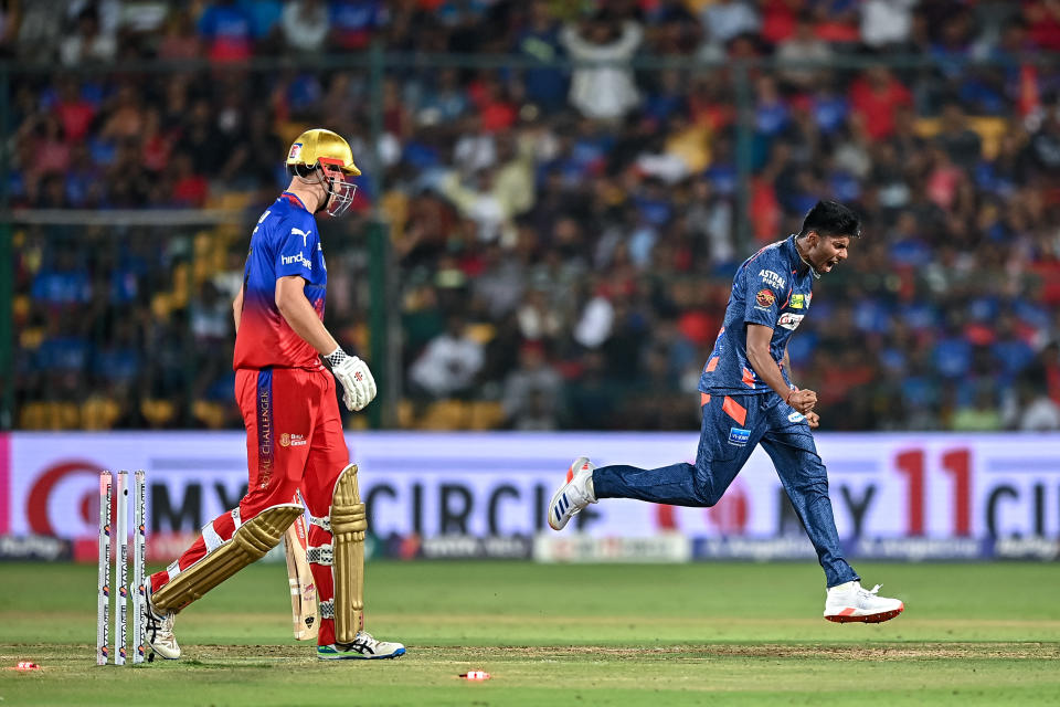 Mayank Yadav celebrating the wicket of Cameron Green.