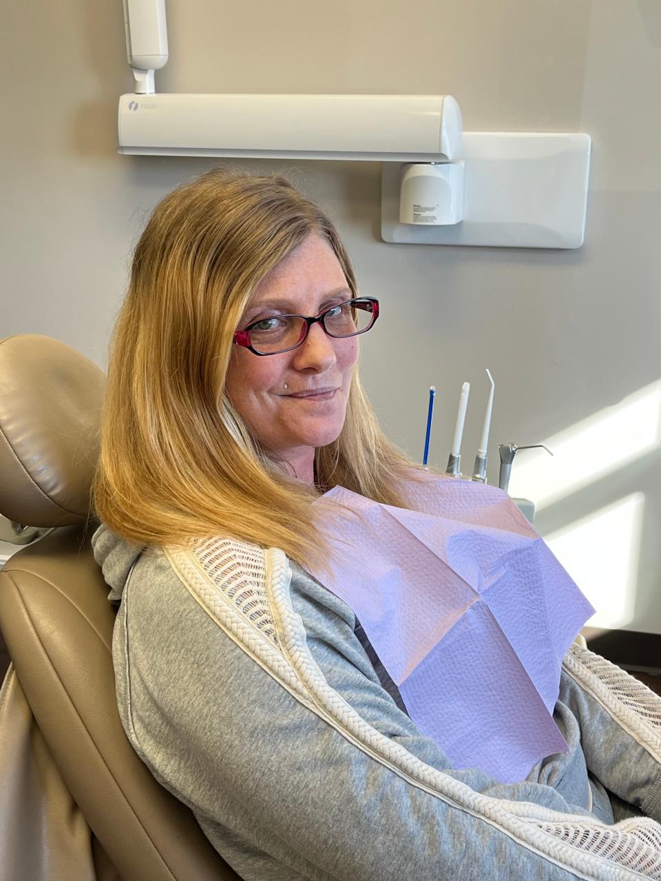 Michelle Klass, a resident of N.E.W. Community Shelter, hasn't smiled with her teeth in over a decade. She's hopeful she'll have better luck with obtaining employment when she no longer has to hide her teeth.