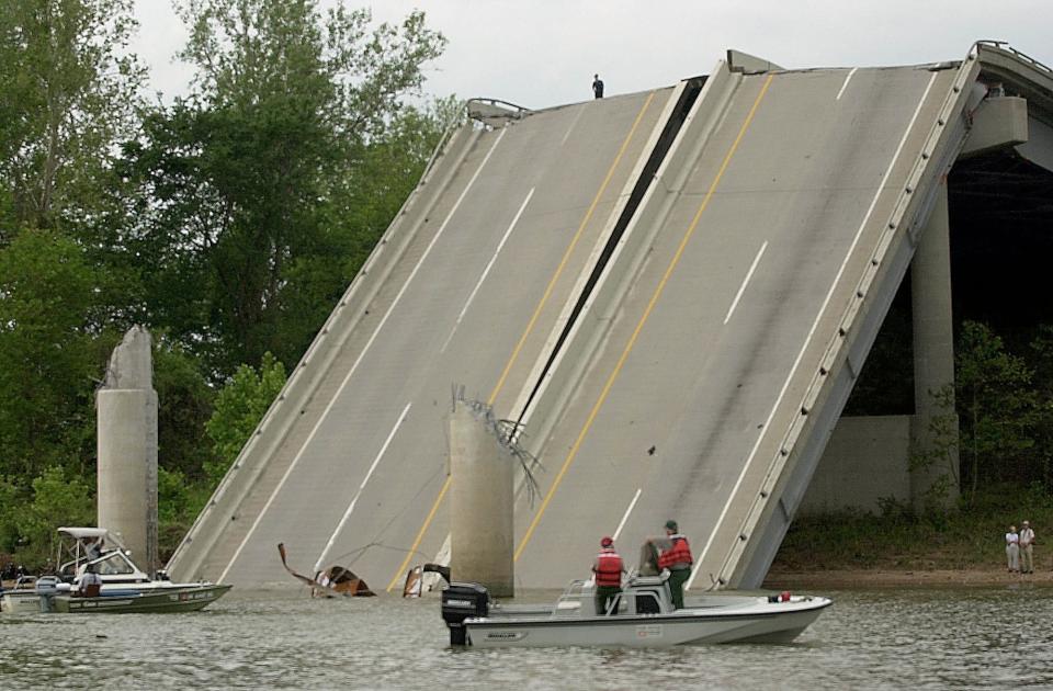 Recovery at the I-40 bridge over the Arkansas River near Webbers Falls, Okla., that collapsed Sunday morning, May 26, 2002.