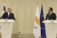 Cypriot president Nikos Christodoulides, right, and Israeli Prime Minister Benjamin Netanyahu talk to the media during a press conference after their meeting at the presidential palace in capital Nicosia, Cyprus, on Sunday, Sept. 3, 2023. An official statement said Christodoulides and Netanyahu will touch on expanding energy cooperation and bilateral ties, as well as Israel's relations with the European Union. The leaders' meeting comes a day ahead of a trilateral meeting that will include Greek Prime Minister Kyriakos Mitsotakis. (Iakovos Hatzistavrou Pool via AP)
