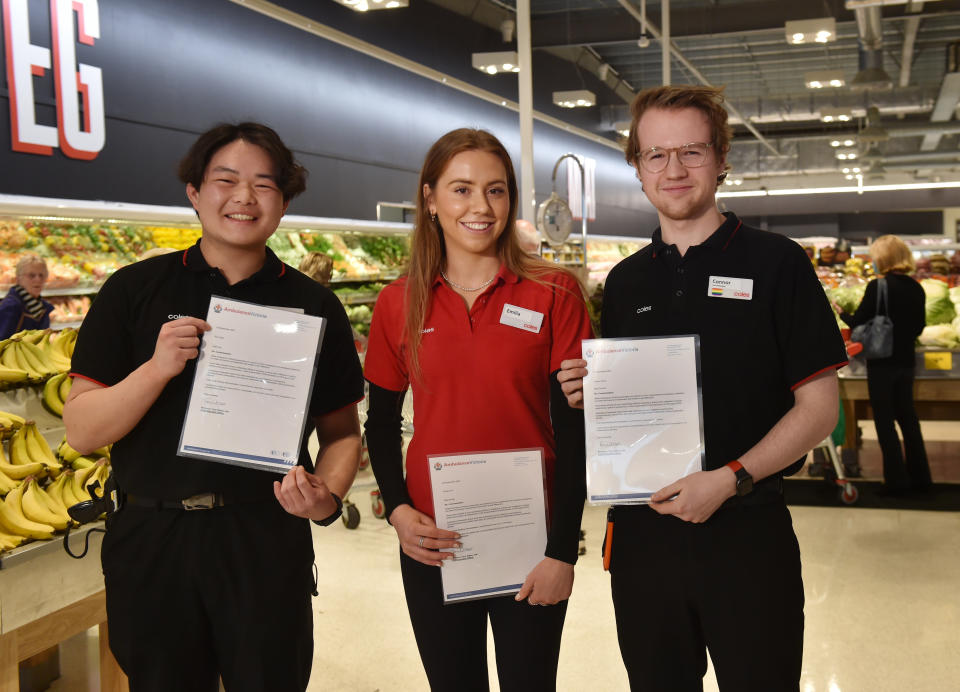 Pictured are Coles employees Dairy Manager Roy Zeng, Service team member Emilia Cox and Manager on Duty Connor Ferris