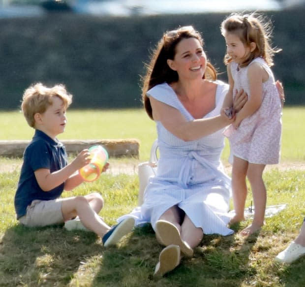 <p>Kate Middleton looks like any mother spending a day in the sun with her kids, although we suspect most mothers aren't hanging out to watch their significant others play for a Maserati Royal Charity Polo Trophy.</p>