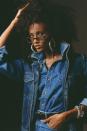 <p> Years before she tied the knot with rock legend David Bowie in 1992, the supermodel was a muse for designers like Gianni Versace and Yves Saint Laurent. Here, she wears an all-denim look paired with silver accessories. </p>