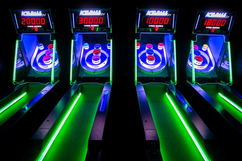 Four IceBall machines are seen inside Double Tap prior to its grand opening Wednesday on the Ped Mall in Iowa City. The new "beercade" is owned by a Cedar Falls company.