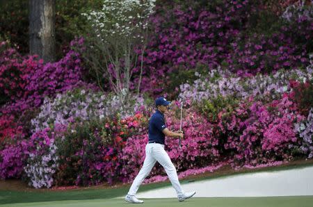 Jordan Spieth of the U.S. watches his putt on the 13th green during first round play of the 2018 Masters golf tournament at the Augusta National Golf Club in Augusta, Georgia, U.S., April 5, 2018. REUTERS/Mike Segar