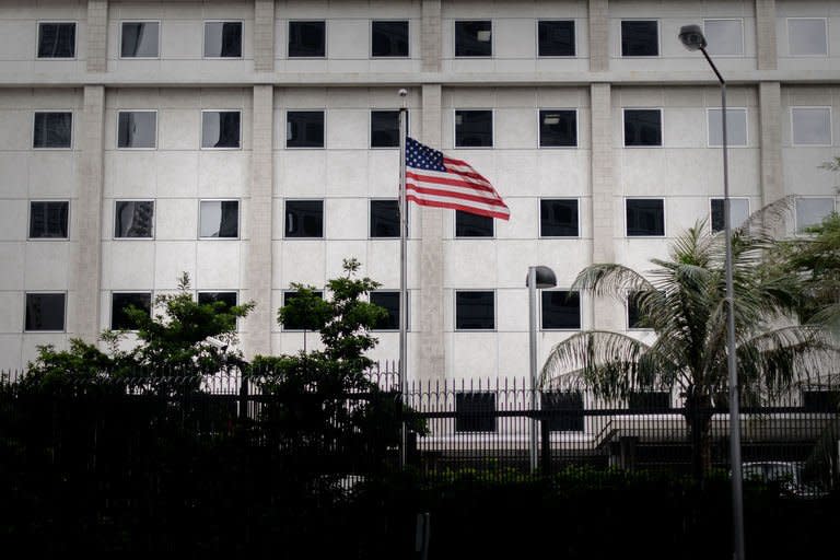 The flag flutters in front of the US consulate in Hong Kong on June 10, 2013. Edward Snowden, a 29-year-old US government contractor and the source who leaked details of a vast secret US program to monitor Internet users was reported to be in Hong Kong and remained there ever since, holed up in a hotel room