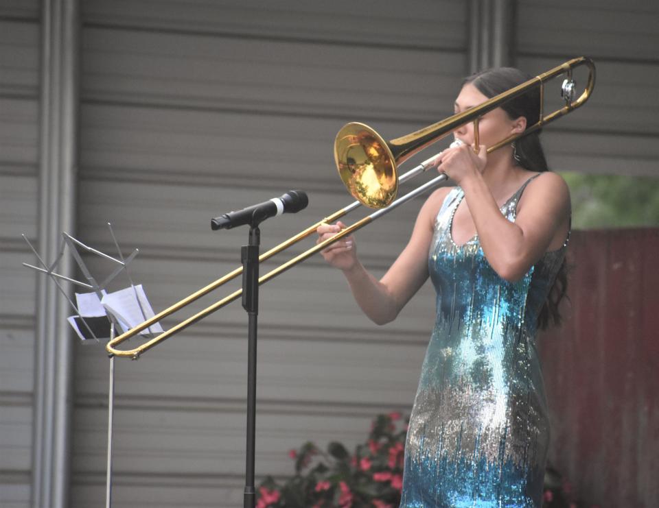 Tanana Emmendorfer, a contestant Sunday evening during the annual Lenawee County Fair queen's contest, won the Talent Award for her trombone solo to the Tommy Tutone song, "867-5309/Jenny." Emmendorfer also earned first runner-up in the competition.