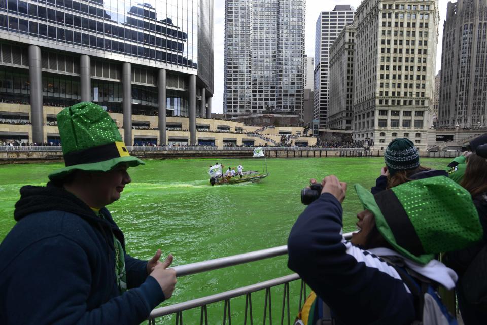 The Chicago River being dyed green ahead of the St. Patrick's Day parade in Chicago, Saturday, March 15, 2014. (AP Photo/ Paul Beaty)