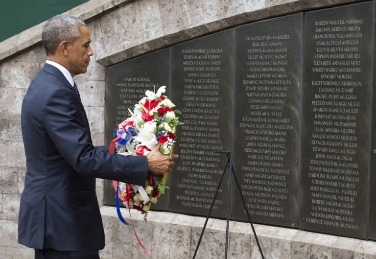 US President Barack Obama lays a wreath at the Memorial Park in Nairobi on July 25, 2015, commemorating the August 7, 1998 bombing of the US Embassy, which killed more than 218 Americans and Kenyans, and injured more than 5,000 people
