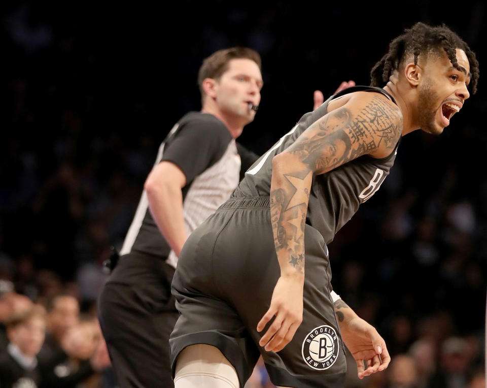 NEW YORK, NEW YORK - APRIL 20:  D'Angelo Russell #1 of the Brooklyn Nets celebrates his shot in the first half against the Philadelphia 76ers at Barclays Center on April 20, 2019 in the Brooklyn borough of New York City. NOTE TO USER: User expressly acknowledges and agrees that, by downloading and or using this photograph, User is consenting to the terms and conditions of the Getty Images License Agreement. (Photo by Elsa/Getty Images)
