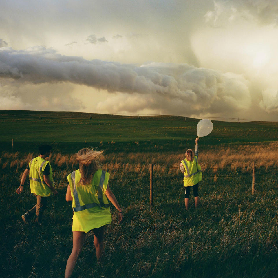 Morgan Schneider, a doctoral meteorology student at the University of Oklahoma, and her team launch a weather balloon near Hyannis, Neb. on June 6.<span class="copyright">Erinn Springer—The New York Times/Redux</span>