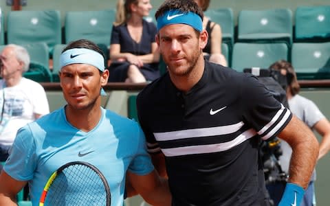 Spain's Rafael Nadal, left, and Argentina's Juan Martin del Potro pose for photographers prior to their semifinal match of the French Open tennis tournament at the Roland Garros stadium in Paris, France, Friday, June 8, 2018 - Credit: AP