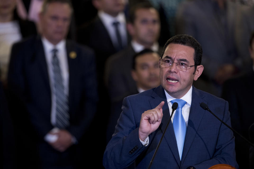 Guatemala's President Jimmy Morales gives a statement, at the National Palace in Guatemala City, Monday, Jan. 7, 2019. Guatemala announced that it is going to withdraw from UN-sponsored anti-corruption commission. (AP Photo/Moises Castillo)