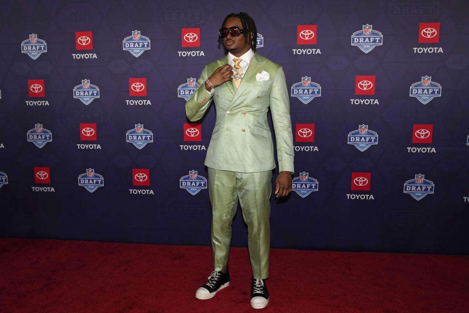 Alabama edge rusher Dallas Turner poses on the red carpet prior to the first round of the NFL football draft, Thursday, April 25, 2024, in Detroit.  (AP Photo/Carlos Osorio)