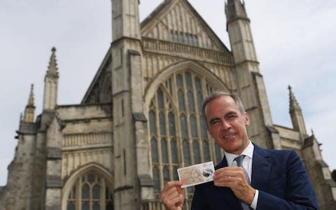 The Governor of the Bank of England, Mark Carney, during the unveiling at Winchester Cathedral, of the new £10 note featuring Jane Austen - Credit: Steve Parsons/PA Wire