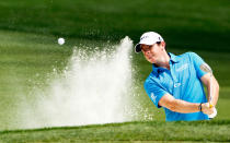 CHARLOTTE, NC - MAY 06: Rory McIlroy of Northern Ireland hits a shot from a greenside bunker on the sixth hole during the final round of the Wells Fargo Championship at the Quail Hollow Club on May 6, 2012 in Charlotte, North Carolina. (Photo by Mike Ehrmann/Getty Images)