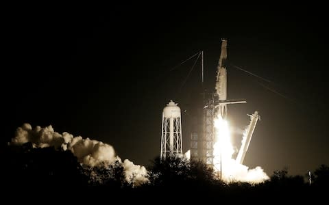 SpaceX Falcon 9 launch - Credit: AP Photo/Terry Renna