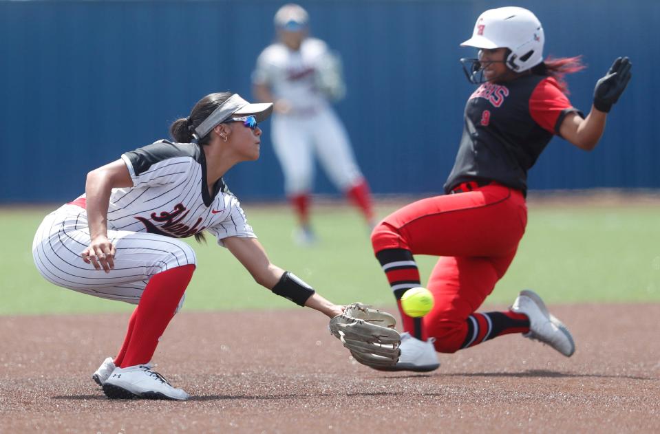Hanks High School's Judith Osuna makes a play at second base against Colleyville Heritage High School during their region 1-5A semifinal game at Midland Greenwood High School on Friday, May 19, 2023.
