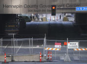 The tunnel on S. 6th Street that goes beneath the Hennepin County Government Center is now closed down to traffic as preparations continue for the murder trial of former Minneapolis police officer Derek Chauvin which begins Monday and was seen near the Hennepin County Government Center Thursday, March 4, 2021 in Minneapolis. (David Joles/Star Tribune via AP)