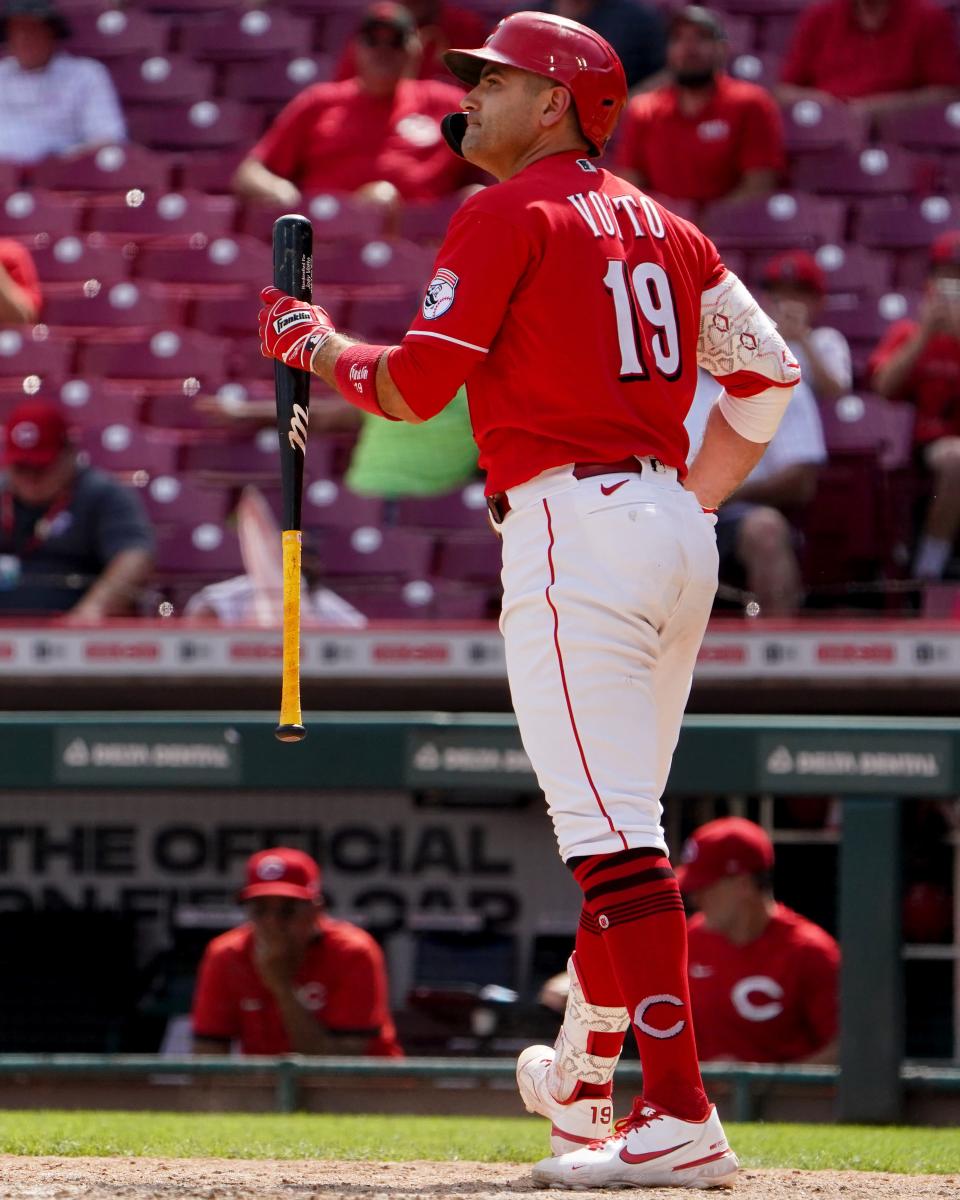 Cincinnati Reds designated hitter Joey Votto (19) reacts after striking out to end the game during the ninth inning of a baseball game against the Miami Marlins, Thursday, July 28, 2022, at Great American Ball Park in Cincinnati. 