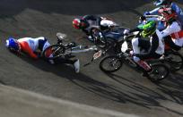 LONDON, ENGLAND - AUGUST 09: (EDITORS NOTE. Image is a retransmission with an alternative crop) Joris Daudet (L) of France goes to ground as the pack crash during the Men's BMX Cycling Quarter Finals on Day 13 of the London 2012 Olympic Games at BMX Track on August 9, 2012 in London, England. (Photo by Phil Walter/Getty Images)